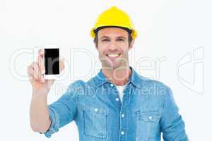 Happy carpenter showing smart phone