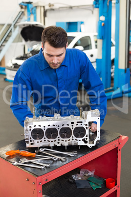 Mechanic working on an engine