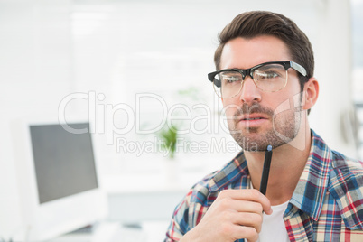 Concentrated casual businessman thinking