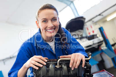 Mechanic working on an engine