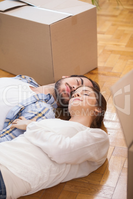 Cute couple lying on the floor