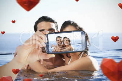 Composite image of valentines couple