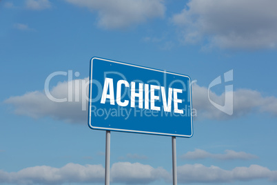 Achieve sign against sky