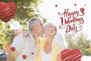 Composite image of cute valentines couple