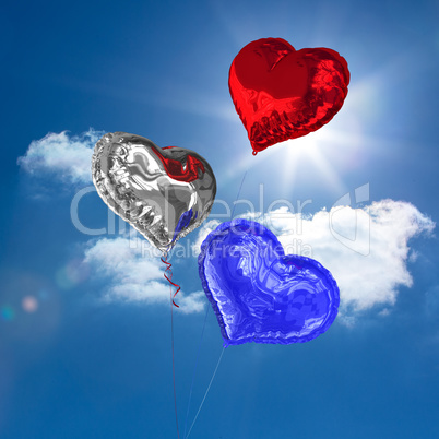 Composite image of heart balloons