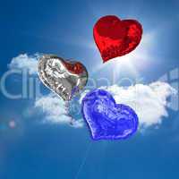 Composite image of heart balloons