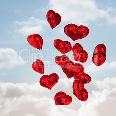 Composite image of heart balloons