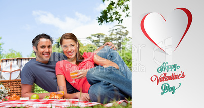 Composite image of cute valentines couple