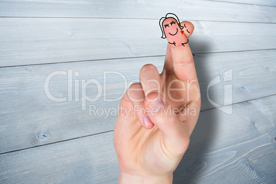 Composite image of fingers crossed like a couple