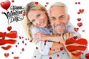 Composite image of cute valentines couple