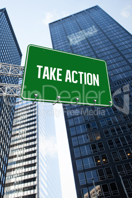 Take action against low angle view of skyscrapers