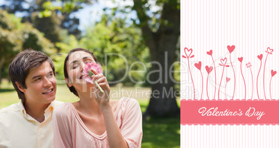 Composite image of cute valentines couple