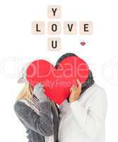 Composite image of cute valentines couple