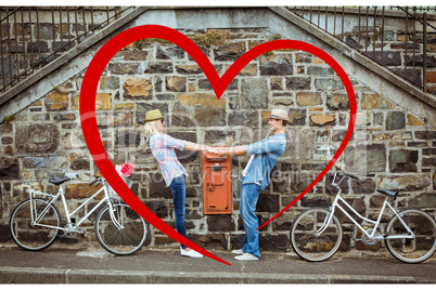 Composite image of cute valentines couple