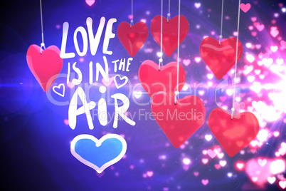 Composite image of love is in the air