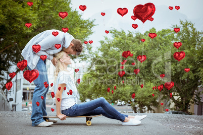 Composite image of cute valentines couple