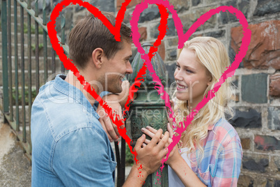 Composite image of cute valentines couple