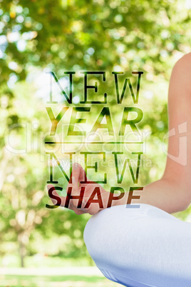 Composite image of close up of meditating young woman