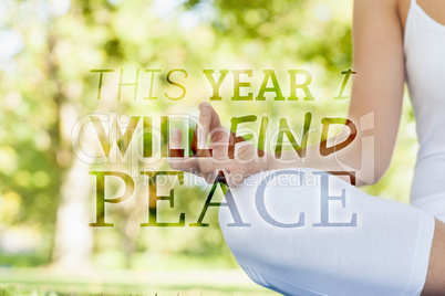 Composite image of mid section of calm young woman meditating