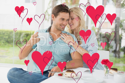 Composite image of cute valentines couple