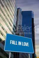 Fall in love against low angle view of skyscrapers