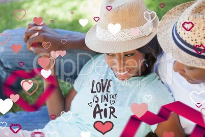 Composite image of cute valentines couple