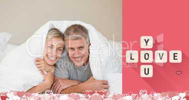 Composite image of cute valentines couple