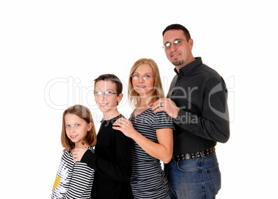 Family standing in profile.