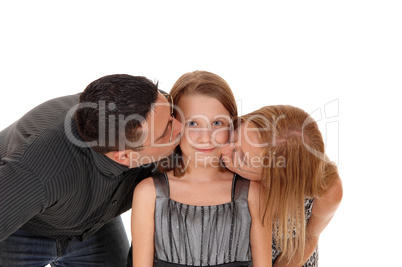 Parents kissing there daughter.