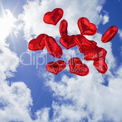 Composite image of heart balloons