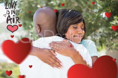 Composite image of cute valentines couple