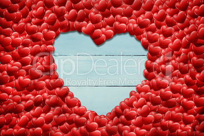 Composite image of red love hearts