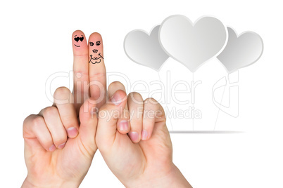 Composite image of fingers crossed like a couple