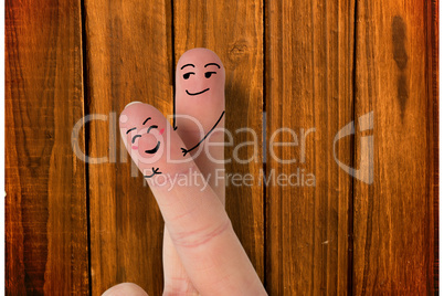 Composite image of fingers crossed like a couple