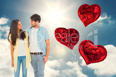 Composite image of happy casual couple smiling at each other