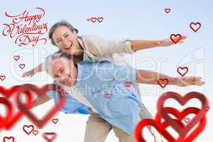 Composite image of cute valentines couple