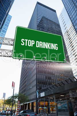 Stop drinking against skyscraper in city