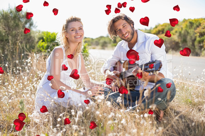 Composite image of cute valentines couple