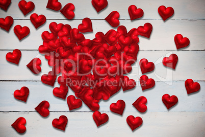 Composite image of red love hearts