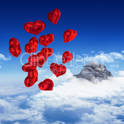 Composite image of heart balloons