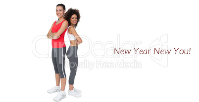 Portrait of two fit young women with arms crossed