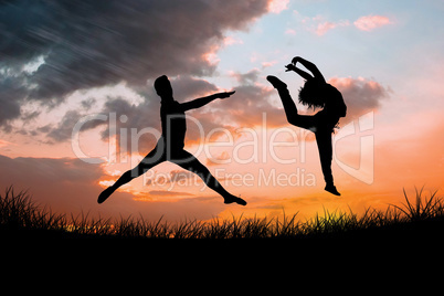 Composite image of male ballet dancer jumping