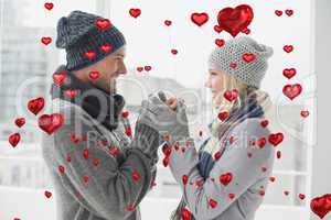 Composite image of cute valentines couple