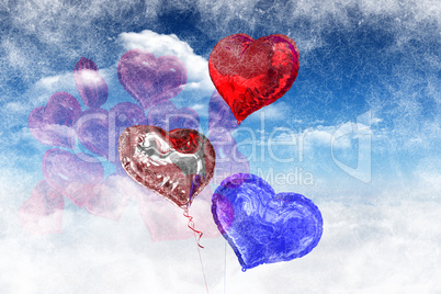 Composite image of heart balloons