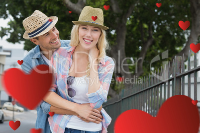 Composite image of cute valentines couple