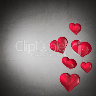 Composite image of floating love hearts