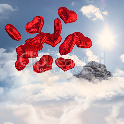 Composite image of heart balloons