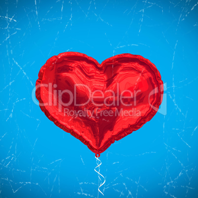 Composite image of red heart balloon