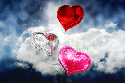 Composite image of heart balloons