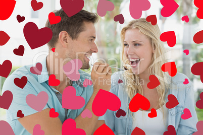 Composite image of cute valentines couple